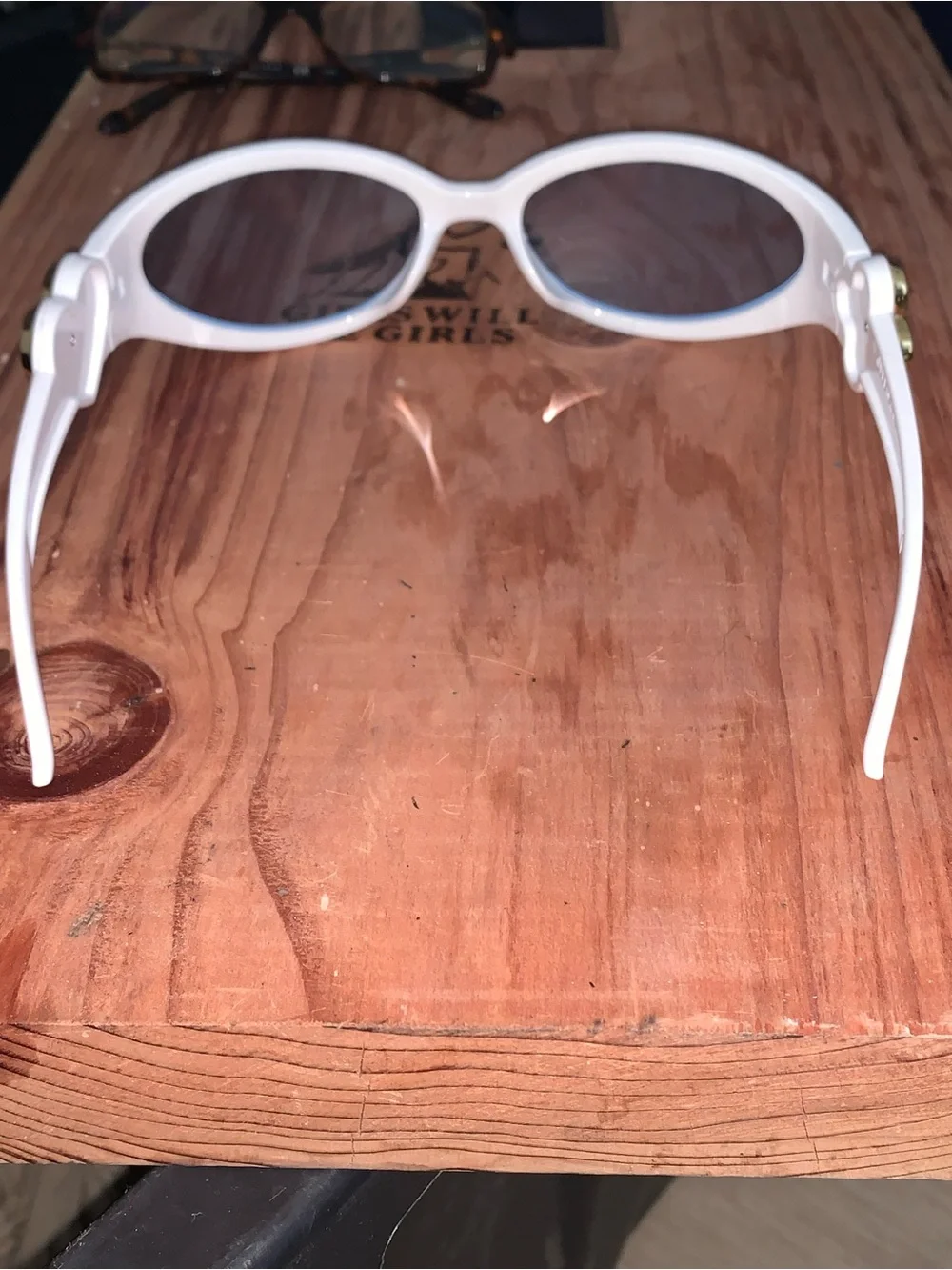 White Oval Sunglasses with Light Blue Lenses